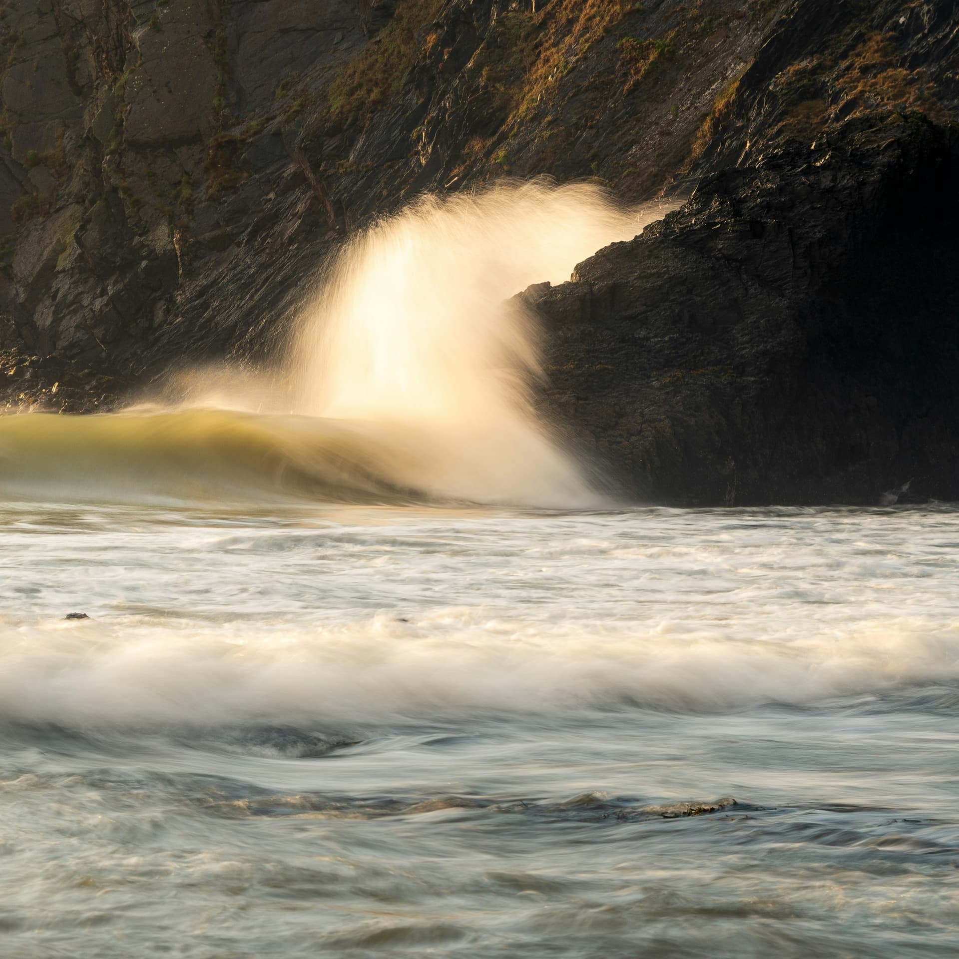 Dramatic waves breaking on Pembrokeshire Coast cliffs